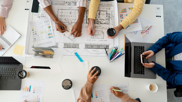 a group of people sitting around a table